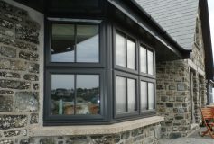 What are the benefits of double-glazed windows?